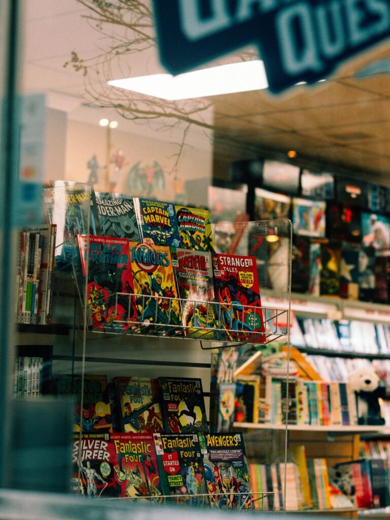 Colorful comic books displayed in a store window