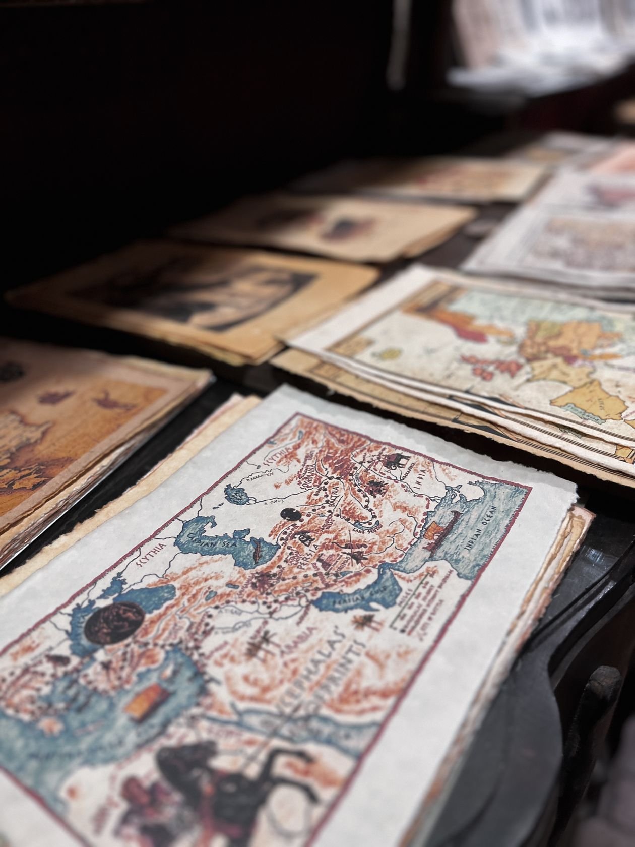 A collection of antique maps on display